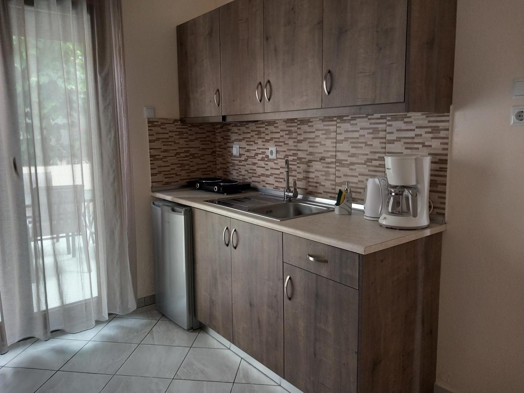 Maria Dina Apartments 1 Potos Bilik gambar
